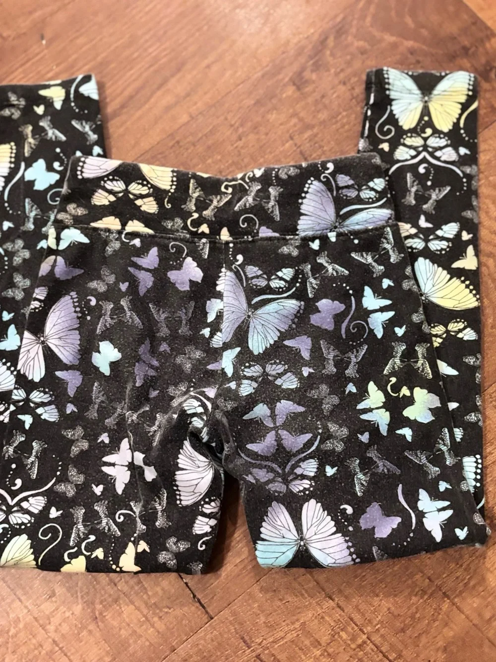Justice Black Leggings with Pastel Butterfly Accents